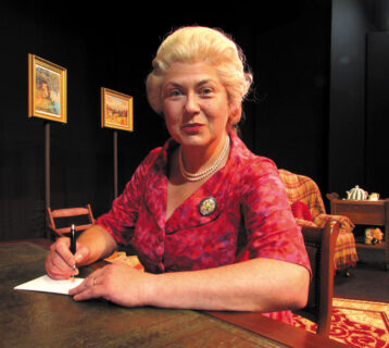 Mrs.-C-at-desk-Act-1