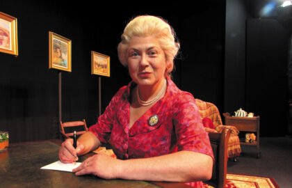 Mrs.-C-at-desk-Act-1