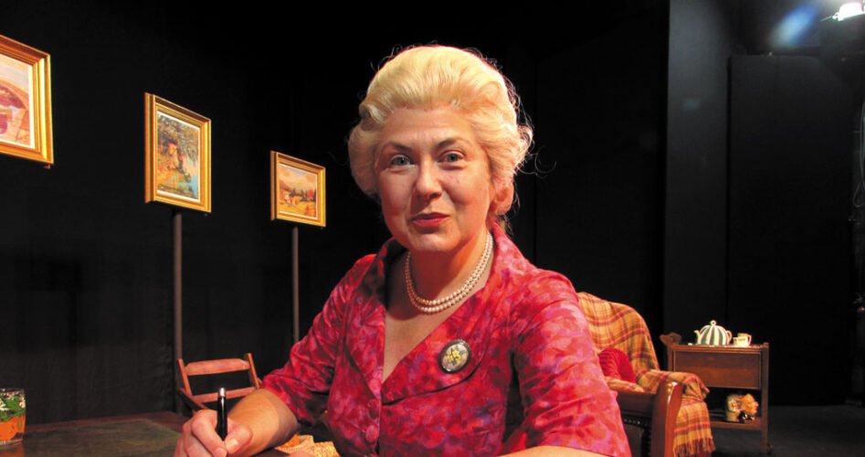 Mrs.-C-at-desk-Act-1